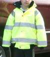 High
visibility coats / high visibility jackets for children. Yellow high visibility coats / jackets for  children to wear. The yellow coats have a waterproof fabric outer layer with retro-reflective tape to make them very high visibility
at night. These high visibility jackets / coats have a warm quilted lining. Click here to find out more about high vis coats  high viz jackets.